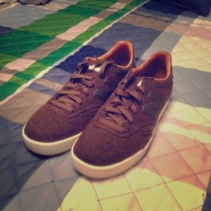 New balance REVlite shoes.